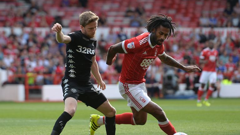 Eunan O'Kane and Armand Traore in action during the Sky Bet Championship match at the City Ground