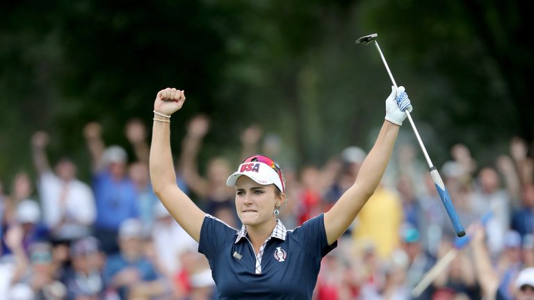 Lexi Thompson of the United States team plays her celebrates holing an eagle putt 