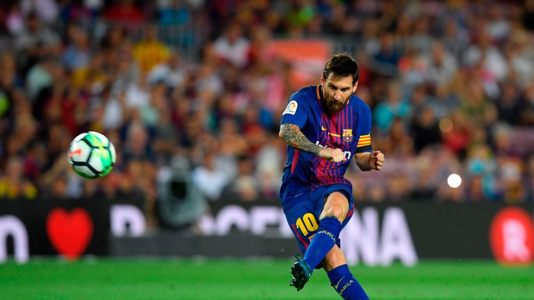 Barcelona's Argentinian forward Lionel Messi kicks the ball during the Spanish league footbal match FC Barcelona vs Real Betis at the Camp Nou stadium in B