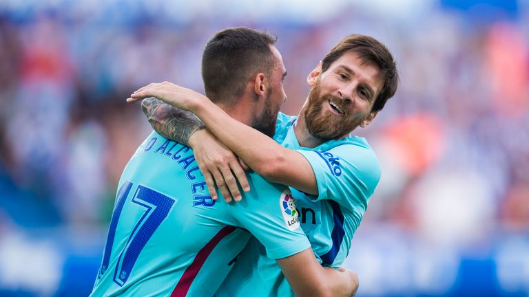 VITORIA-GASTEIZ, SPAIN - AUGUST 26:  Lionel Messi of FC Barcelona celebrates with his teammates Paco Alcacer of FC Barcelona after scoring his team's secon
