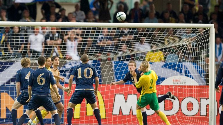 Scotland's Gary Naysmith (back right) heads the ball off the line in a 2-1 victory over Lithuania in 2006.