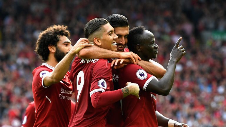Sadio Mane is congratulated by team-mates after his exquisite goal to put Liverpool 2-0 up