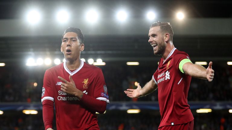 Roberto Firmino of Liverpool celebrates scoring his side's fourth goal with Jordan Henderson of Liverpool during the UEFA Champions League tie v Hoffenheim