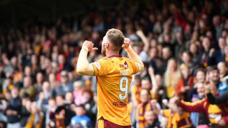 Louis Moult celebrates his winner in front of the Fir Park faithful