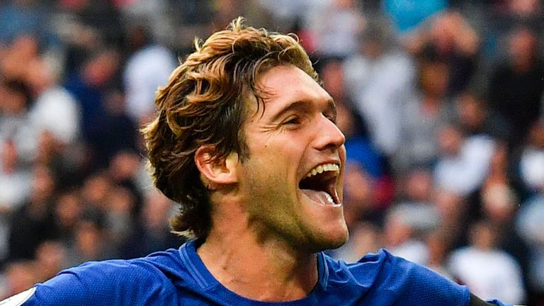 Marcos Alonso celebrates after he scored Chelsea's second goal during the Premier League football match v Tottenham at Wembley