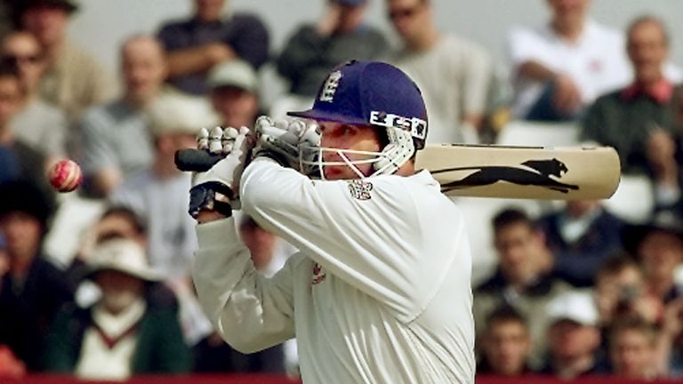 LEEDS, UNITED KINGDOM:  England batsman Mark Butcher (L) hooks the ball away as Australian slipsman Shane Warne (R) looks on on the fifth day of the fourth