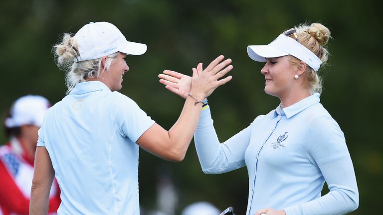 ST LEON-ROT, GERMANY - SEPTEMBER 18:  Melissa Reid  and Charley Hull of team Europe celebrate winning their match during the morning foursomes The Solheim 
