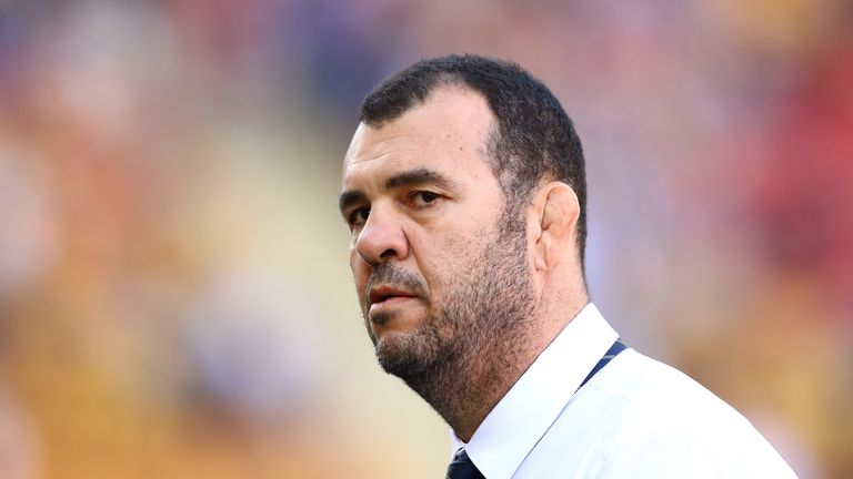 BRISBANE, AUSTRALIA - JUNE 24 2017:  Wallabies coach Michael Cheika watches his team warm up before the Test against Italy