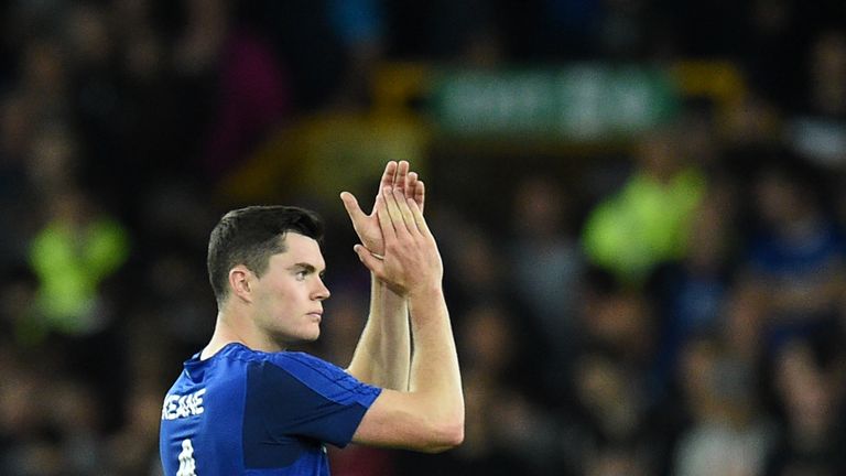 Everton's English defender Michael Keane applauds supporters after the UEFA Europa League playoff round, first leg football match between Everton and Hajdu