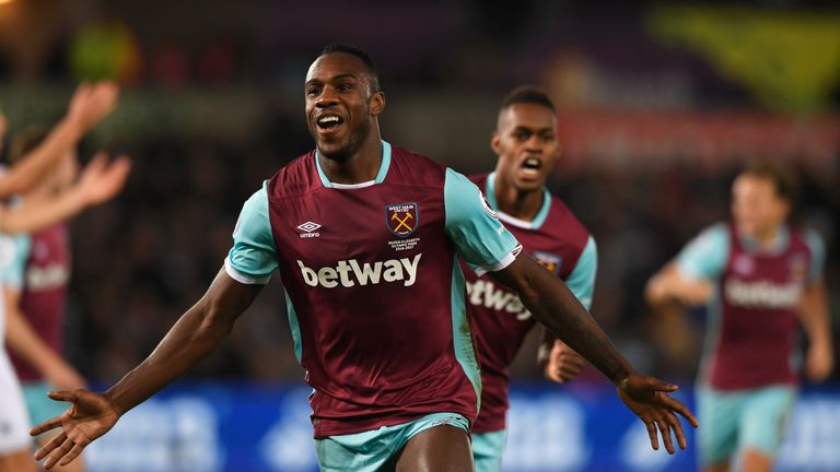 SWANSEA, WALES - DECEMBER 26:  Michail Antonio of West Ham United celebrates scoring his team's third goal during the Premier League match between Swansea 