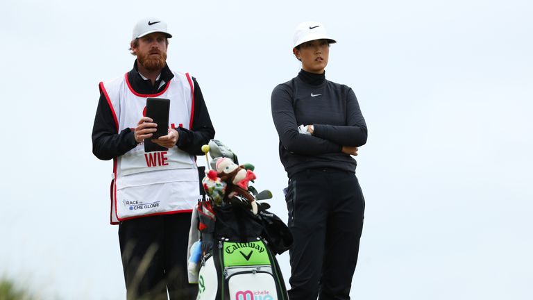 KINGSBARNS, SCOTLAND - AUGUST 06:  Michelle Wie of the United States looks on with her caddie during the final round of the Ricoh Women's British Open at K