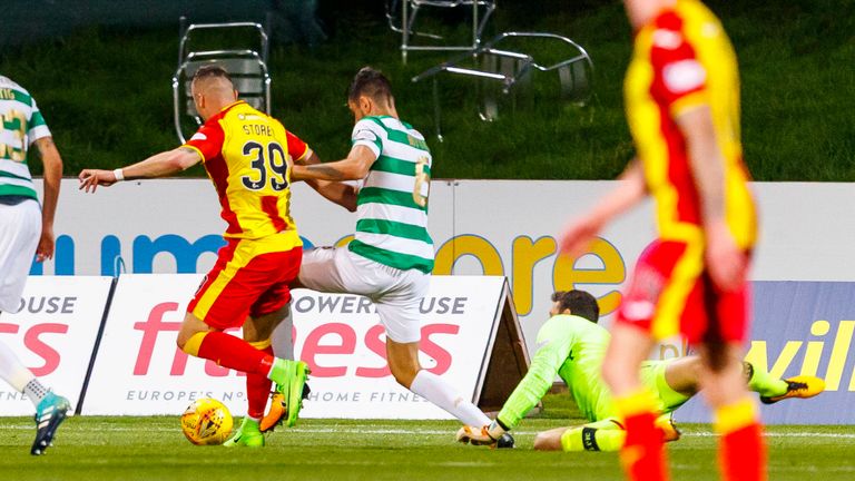 Miles Storey goes down under a challenge from Nir Bitton - but the referee was unmoved 
