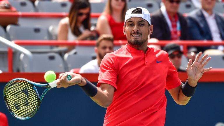 Nick Kyrgios of Australia hits his return against Viktor Troicki of Serbia & Montenegro during day four of the Rogers Cup presen