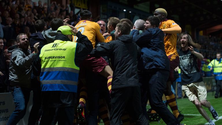 Joy unconfined in  Dingwall as Motherwell players - and fans - celebrate Ross MacLean's winner