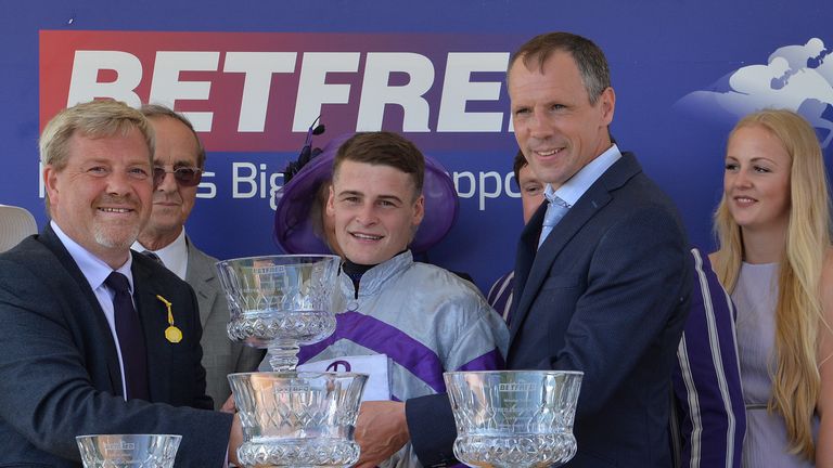 Callum Rodriguez and trainer Iain Jardine celebrate after Nakeeta wins the Betfred Ebor during day four of the 2017 Yorkshire Ebor Festival at York Racecou