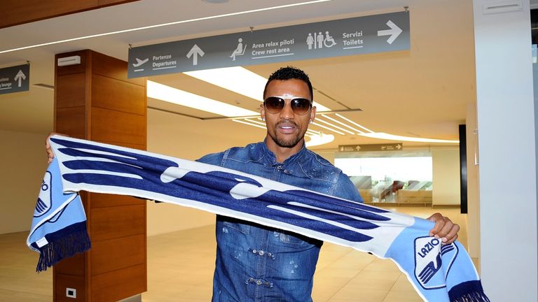 Nani poses for a photo upon arrival at Ciampino airport in Rome