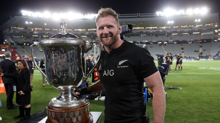 New Zealand's Kieran Reid poses with the Bledisloe Cup after the third rugby Bledisloe Cup Test between the New Zealand All Blacks and Australia at Eden Pa