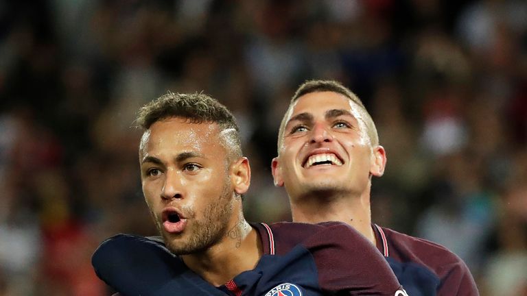 Neymar celebrates his goal with PSG team-mate Marco Verratti during the match against Toulouse at Parc des Princes