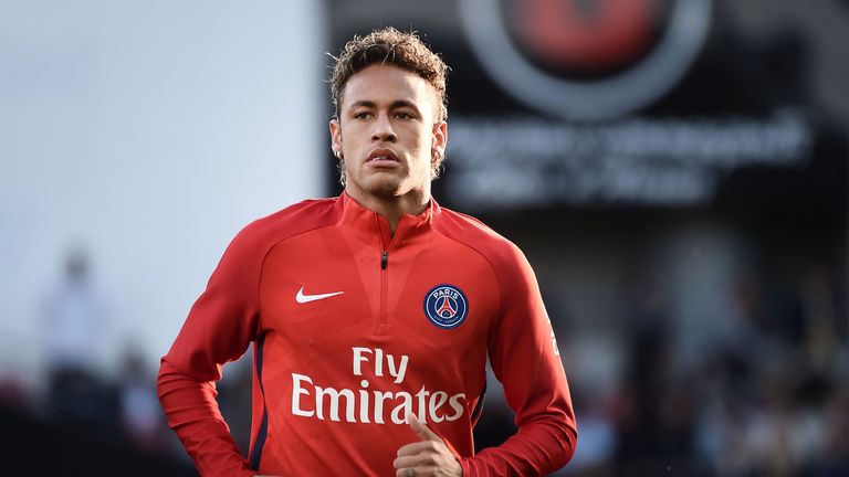 Neymar warms up prior to the Ligue 1 match against Guingamp