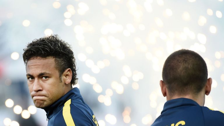 Neymar walks to the pitch prior to the Ligue 1 match against Guingamp