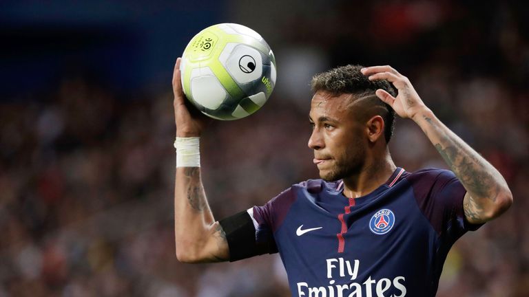 Neymar prepares to take a throw-in during the Ligue 1 match against Toulouse at  Parc des Princes