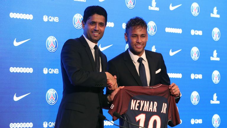 Neymar is unveiled alongside Paris Saint Germain president Nasser Al-Khelaifi during a press conference at the Parc des Princes
