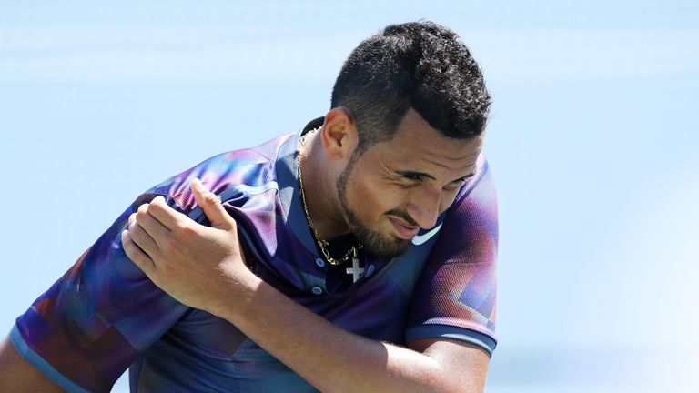 NEW YORK, NY - AUGUST 30:  Nick Kyrgios of Australia holds his shoulder while playing against John Millman of Australia during their first round Men's Sing