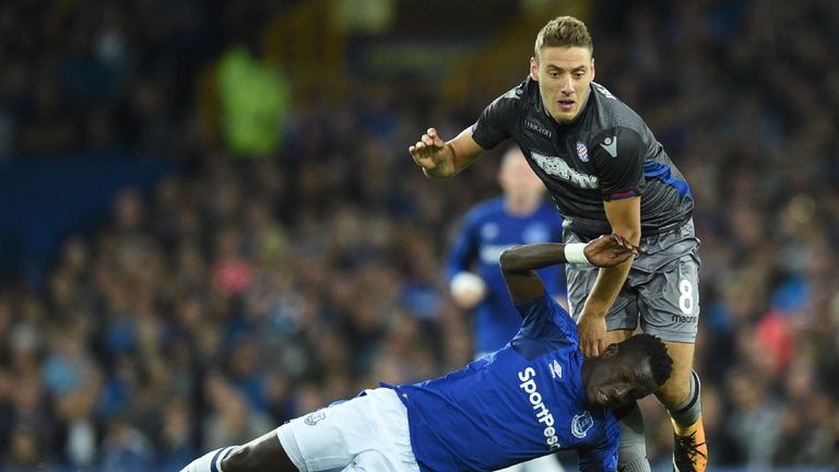 Idrissa Gueye battles with Nikola Vlasic during the UEFA Europa League playoff round, first leg match at Goodison Park