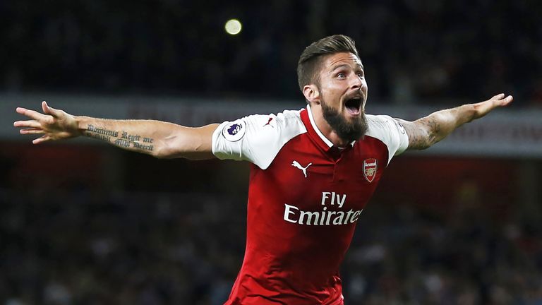 Olivier Giroud celebrates after his goal completes a stunning comeback for Arsenal