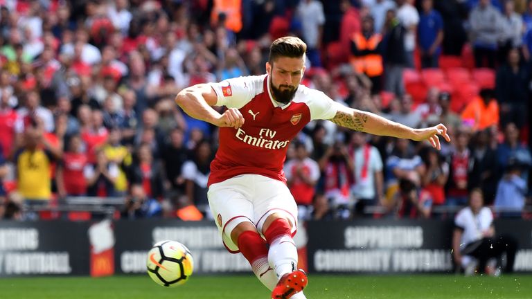 LONDON, ENGLAND - AUGUST 06: Olivier Giroud of Arsenal scores his sides fourth penalty in the penalty shoot out during the The FA Community Shield final be
