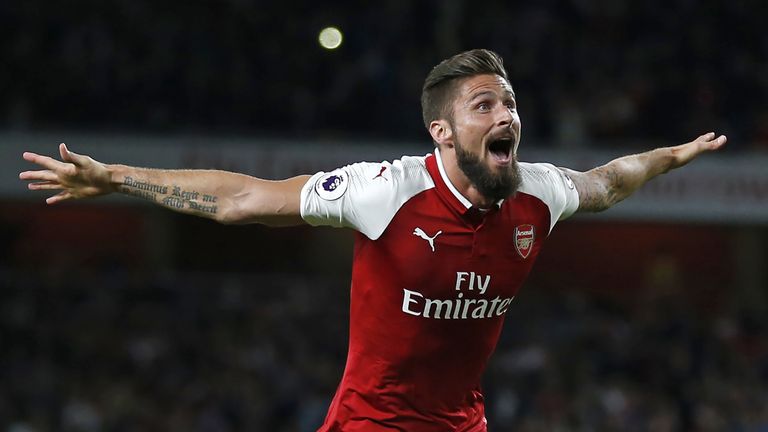 Arsenal's French striker Olivier Giroud celebrates scoring Arsenal's fourth goal during the English Premier League football match between Arsenal and Leice