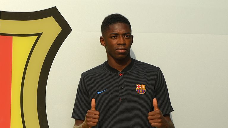 Ousmane Dembele landed in Barcelona on Sunday afternoon where he posed for pictures before Monday's official unveiling at the Nou Camp
