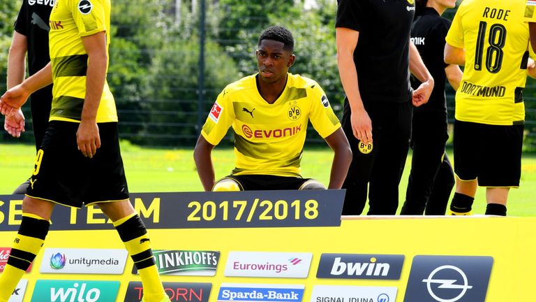 Ousmane Dembele (C) at a team photo during a press event of German first division Bundesliga football club Borussia Dortmund on August 9