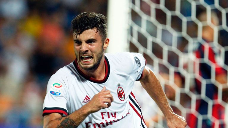 Milan's Italian forward Patrick Cutrone celebrates after scoring during the Italian Serie A football match FC Crotone vs AC Milan on August 20 2017 at the 