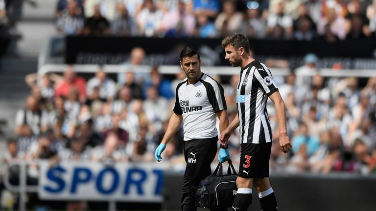 NEWCASTLE UPON TYNE, ENGLAND - AUGUST 13: Paul Dummett of Newcastle United walks off injured during the Premier League match between Newcastle United and T