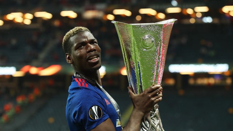 Paul Pogba celebrates with the Europa League trophy