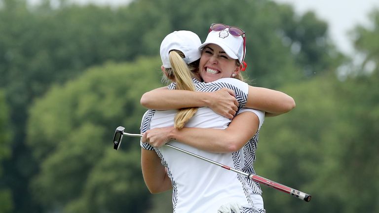 Paula Creamer and Austin Ernst of the United States Team celebrate after they had won their match by 5&3 against Melissa Reid and Emily Pedersen