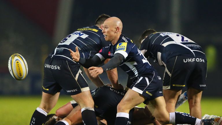 SALFORD, ENGLAND - DECEMBER 02:  Peter Stringer of Sale Sharks passes the ball from a scrum during the Aviva Premiership match between Sale Sharks and Exet