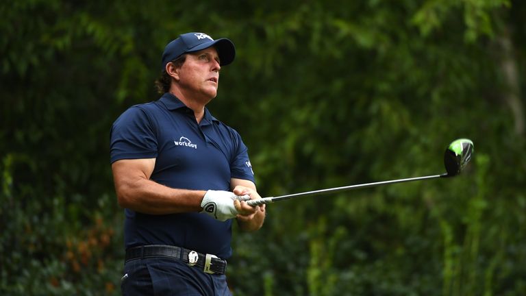 Phil Mickelson of the United States plays his shot from the 12th tee during the second round of the 2017 PGA Championship at Quail Hollow