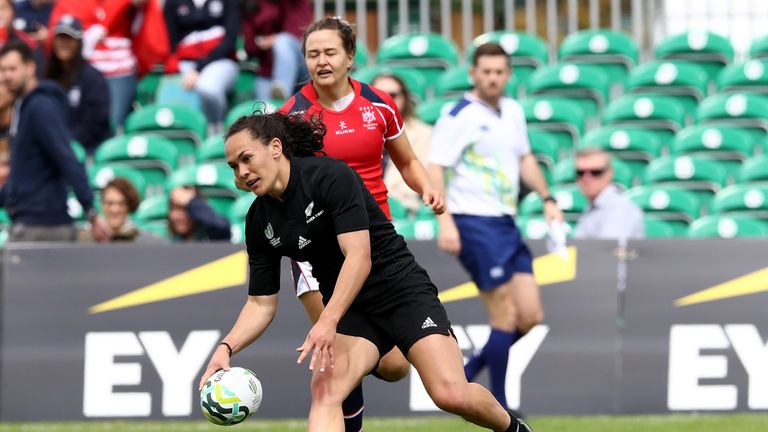 Portia Woodman breaks clear to score against Hong Kong