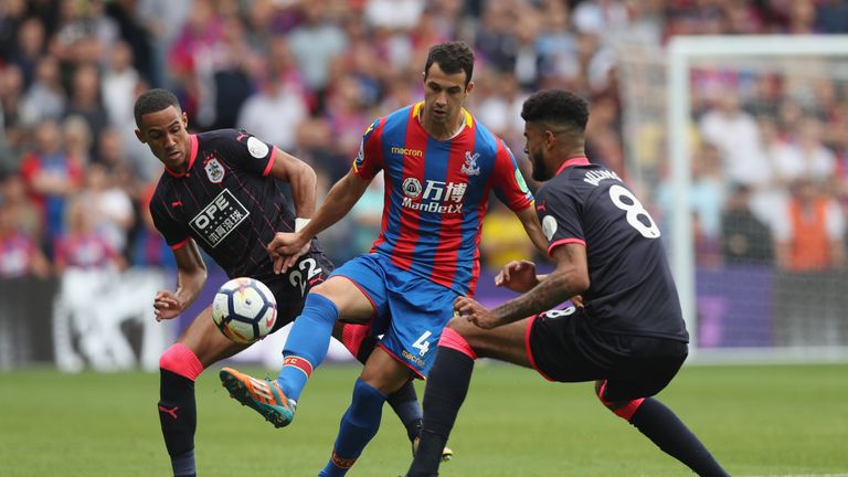 Luka Milivojevic under pressure from Tom Ince and Philip Billing