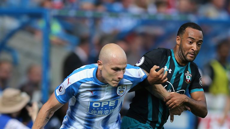 Aaron Mooy and Nathan Redmond in action at the John Smith's Stadium