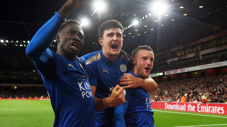 Jamie Vardy is congratulated by team-mates Harry Maguire and Wilfred Ndidi after scoring his second goal