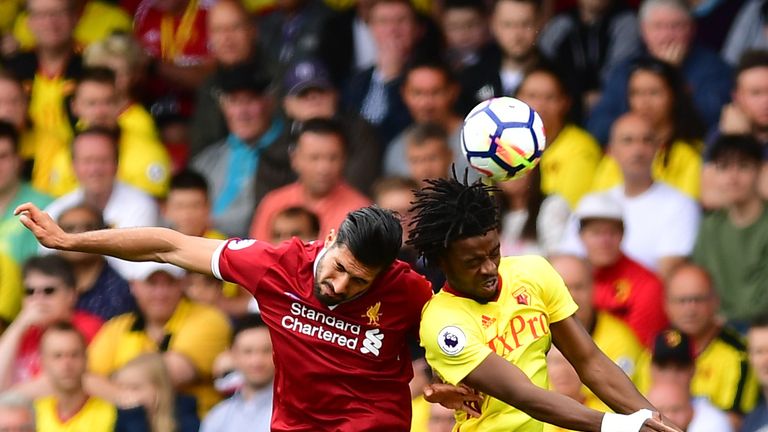 Emre Can and Nathaniel Chalobah battle for possession at Vicarage Road