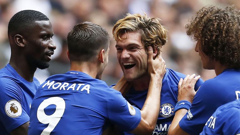 Marcos Alonso is congratulated by his Chelsea team-mates after opening the scoring at Wembley