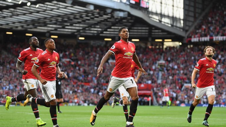 Substitute Marcus Rashford celebrates scoring the games opening goal