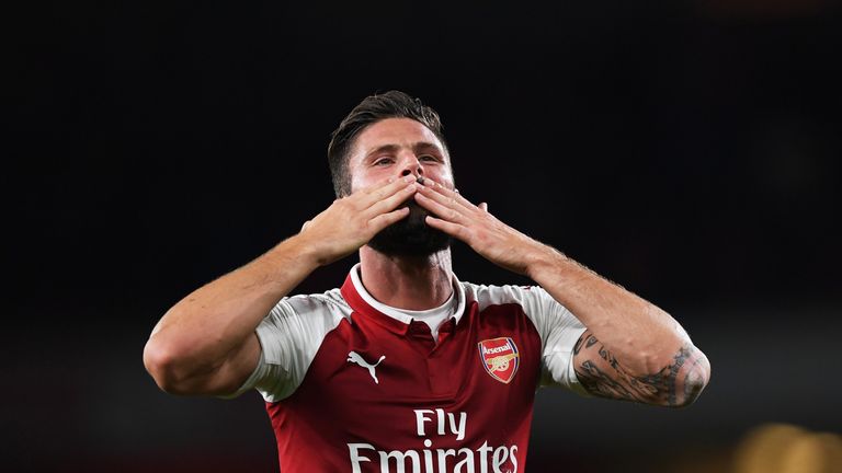 Olivier Giroud acknowledges the crowd following Arsenal's 4-3 victory over Leicester City