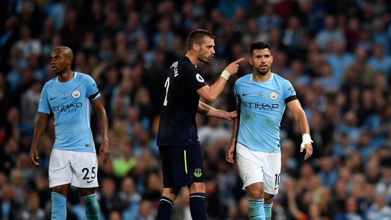 Morgan Schneiderlin confronts Sergio Aguero following his sending off for a second booking