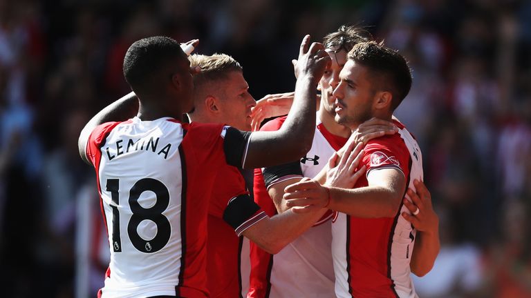 Dusan Tadic is congratualted by his team-mates after converting from the penalty spot