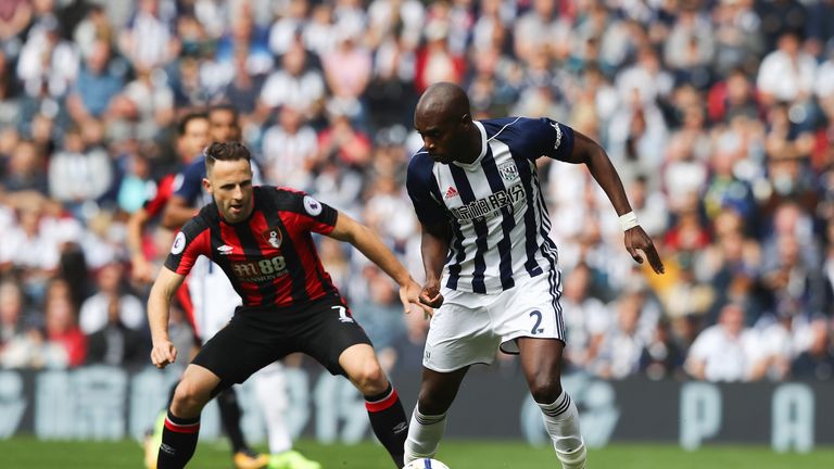 Allan Nyom is put under pressure by Marc Pugh at the The Hawthorns